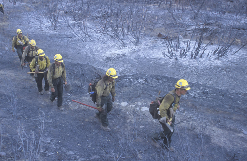 fire-fighting-course-fire-fighters-crossing-charred-terrain-los-angeles